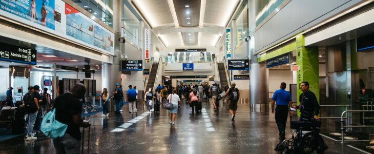 Crowded airport terminal with travelers